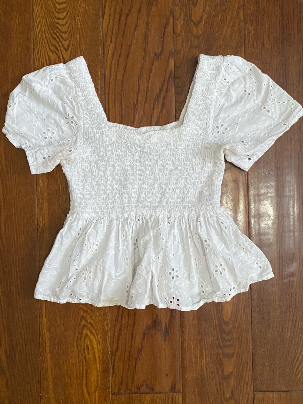 Isa & Ella White Eyelet Smocked Peplum Top - Women